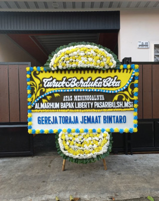 Papan Bunga Duka di Kwelemdua